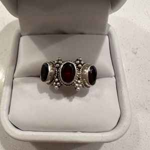 Sterling silver and 3 stone garnet ring size 6